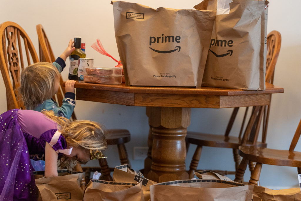 to charge Prime Members for grocery orders under $150
